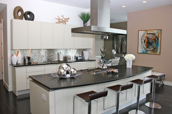 Another version of a multifunctional kitchen island, featuring sleek bar stools