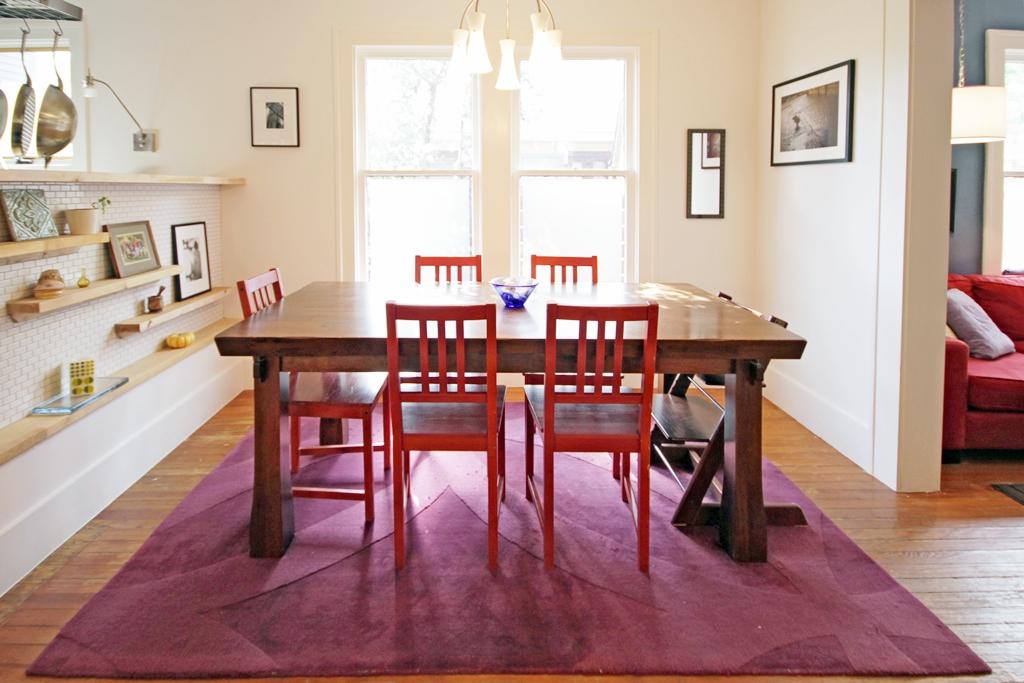 Modern purple rug red chairs