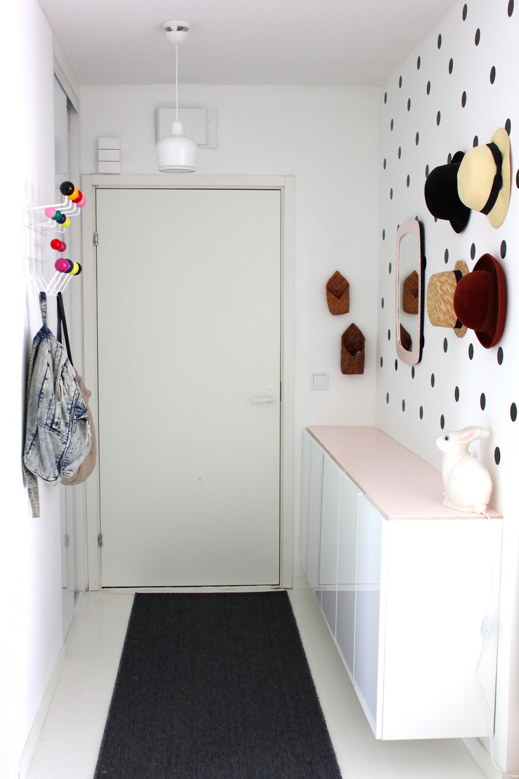 Narrow entryway design polka dots wall