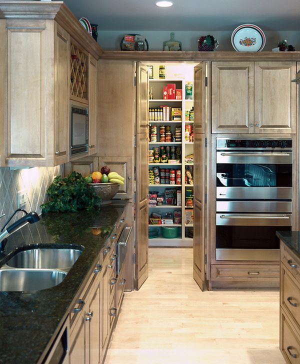Pantry camouflaged behind faux