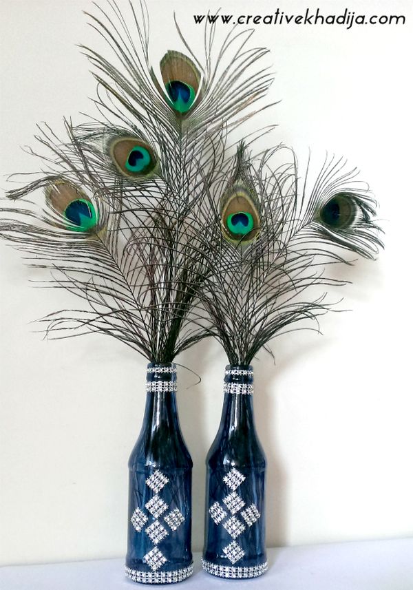 Peacock feathers in vase decoration