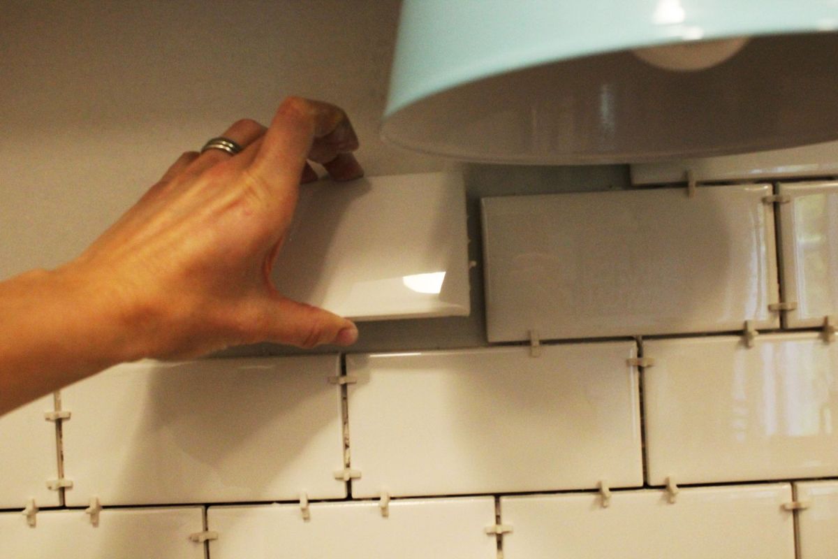 place tile and add spacers