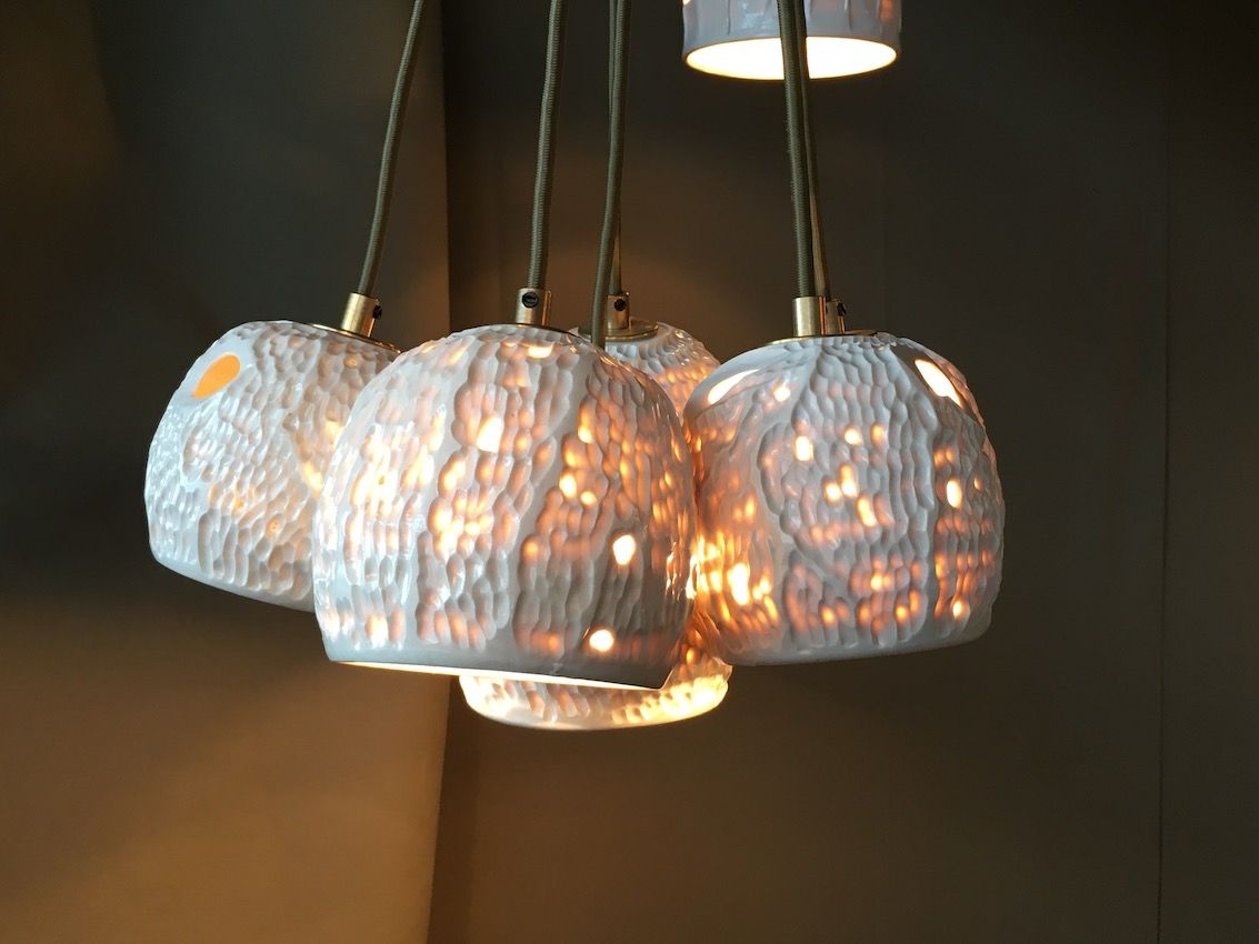 The porcelain lights are available as single pendants as well.