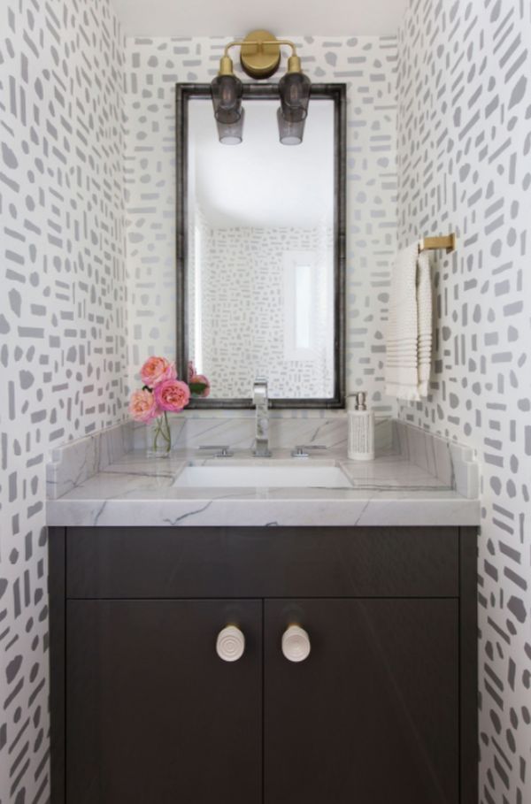 Powder room photo in San Francisco with flat panel cabinets