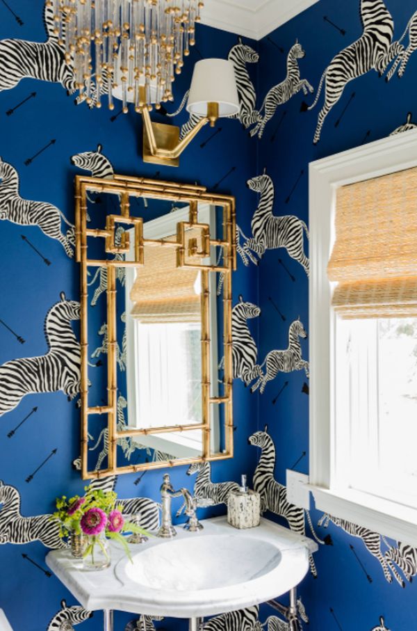 Powder room remodel in San Francisco with a console sink and blue walls