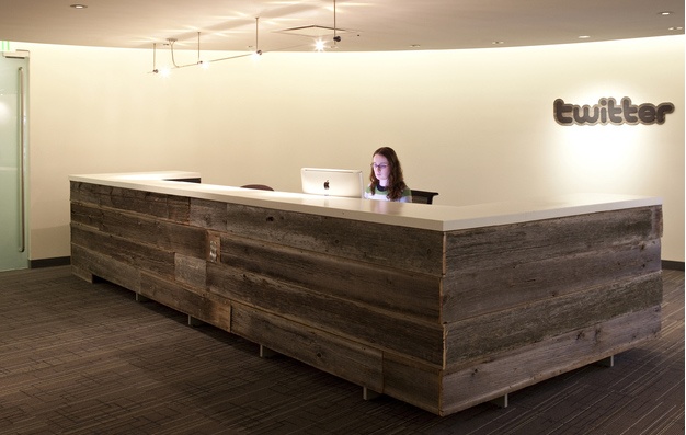 Reclaimed wood reception desk twitter