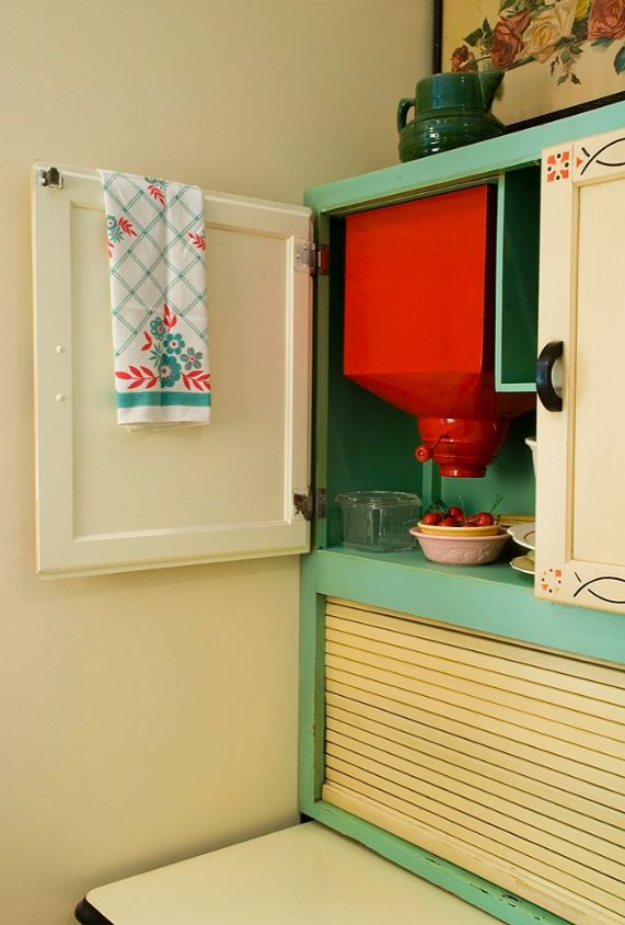 Red flour sifter in hoosier cabinet