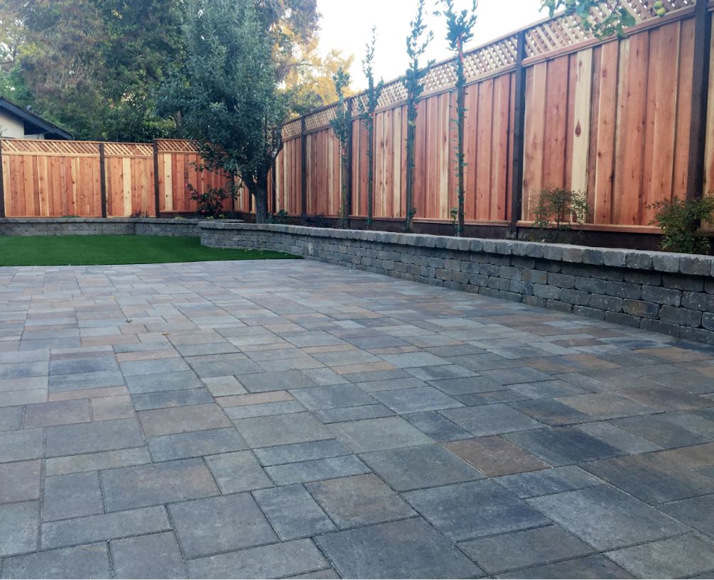 Retaining wall above large patio stone