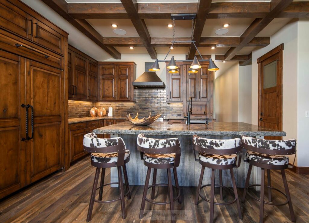 Rustic kitchen with cowhid barstools 1024x740