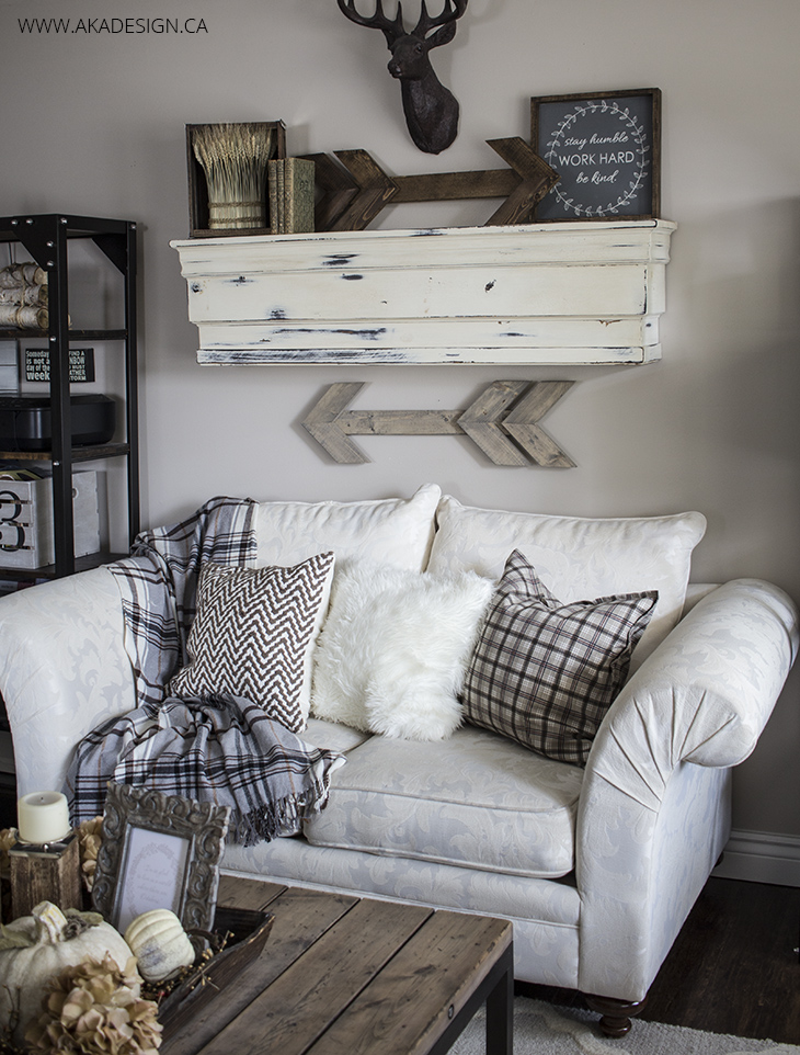 Rustic living room with wood accents arrow