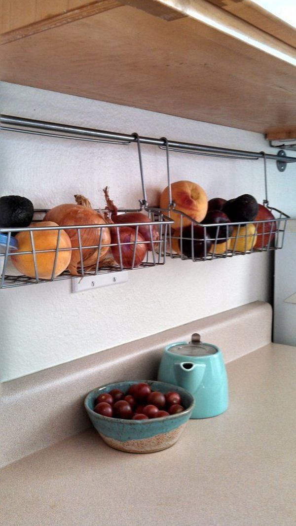 Simple wire baskets under kitchen cabinets