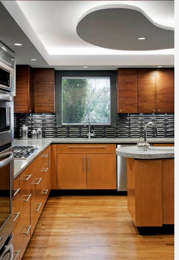 Slab cabinets in wood grain kitchen