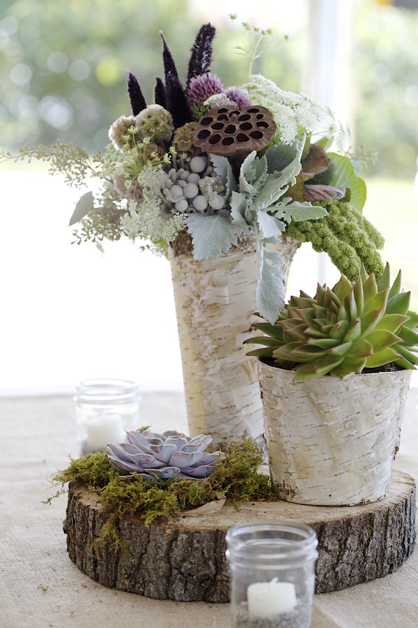 Succulent centerpieces arrangement and wood slice