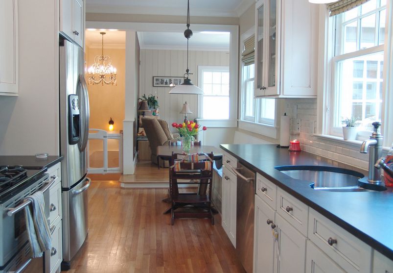 Small kitchen drop leaf table and built in wall seating