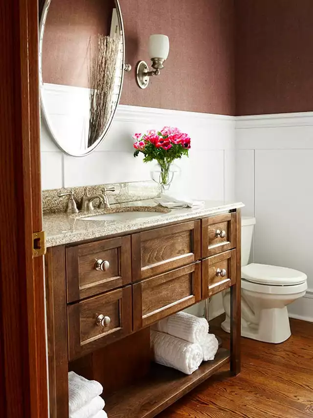 Small powder room brown accents