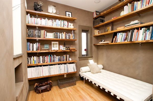 Small room with wall wood shelves