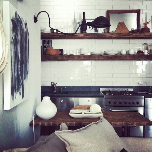 Subway tile and butcher block with stainless stee cabinets