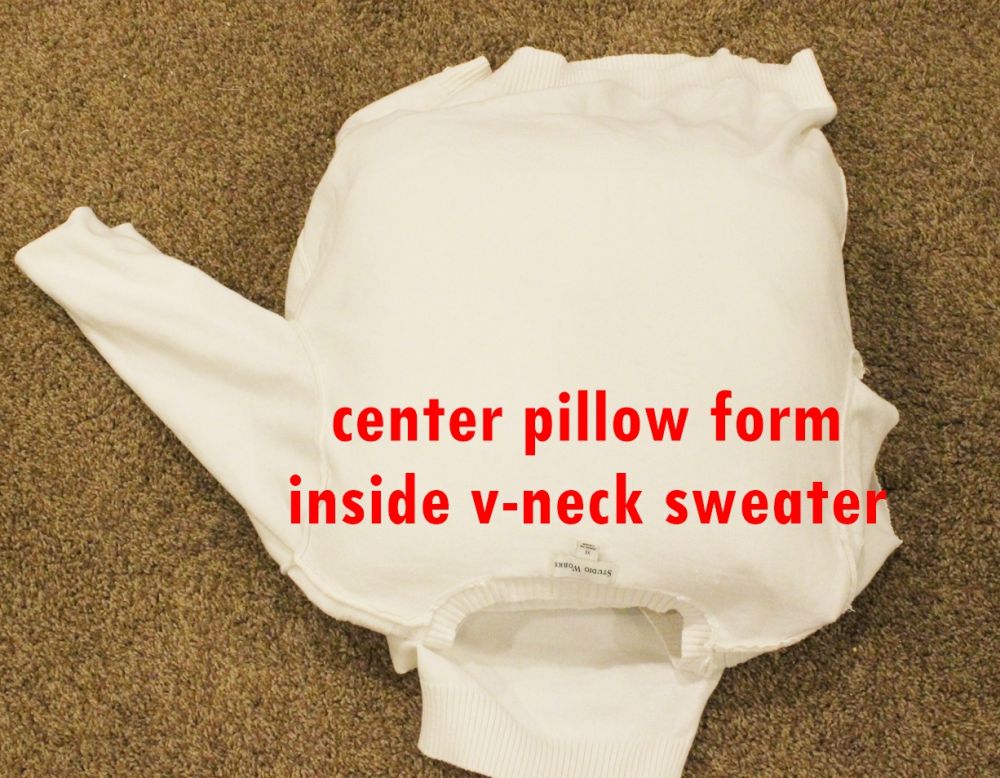 sweater inside-out and slide the pillow