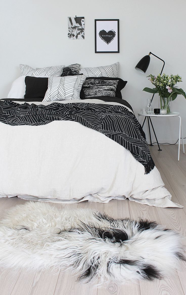 Use Prints And Patterns Throughout The Black and White Bedroom