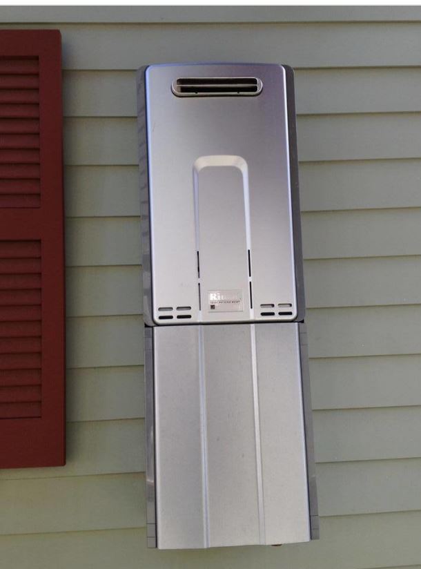 Tankless water heater exterior of home