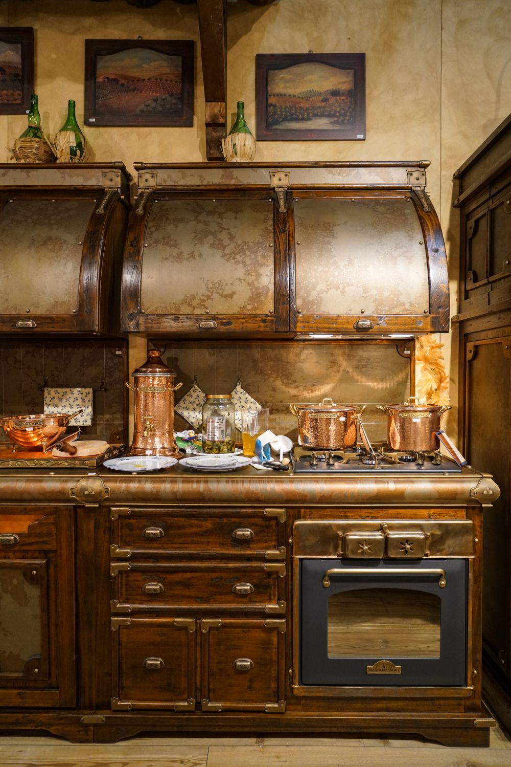 Timeless charming furniture kitchen with corten hood