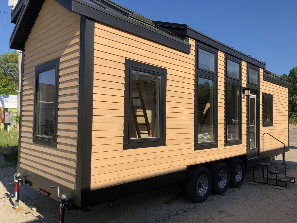 Tiny house on wheels wood and black