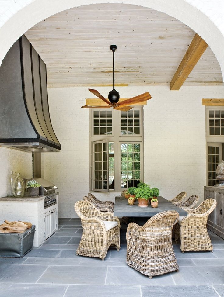 Covered porch with kitchen and dining area