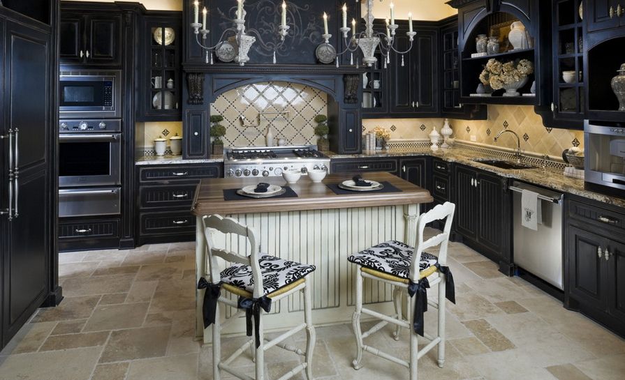 Traditional kitchen black cabinets white island