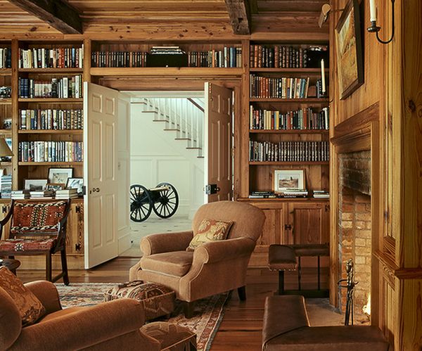 Traditional wood accents living room space above door