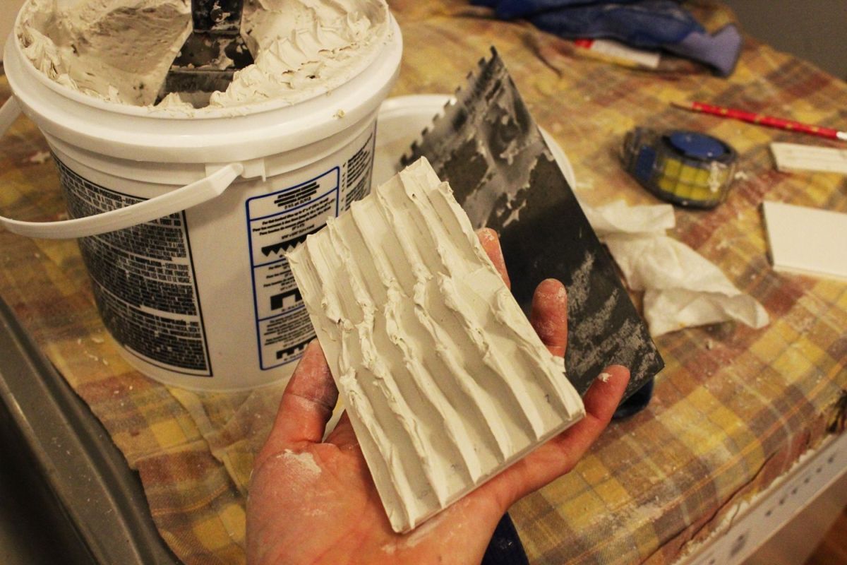 trowel across the mastic