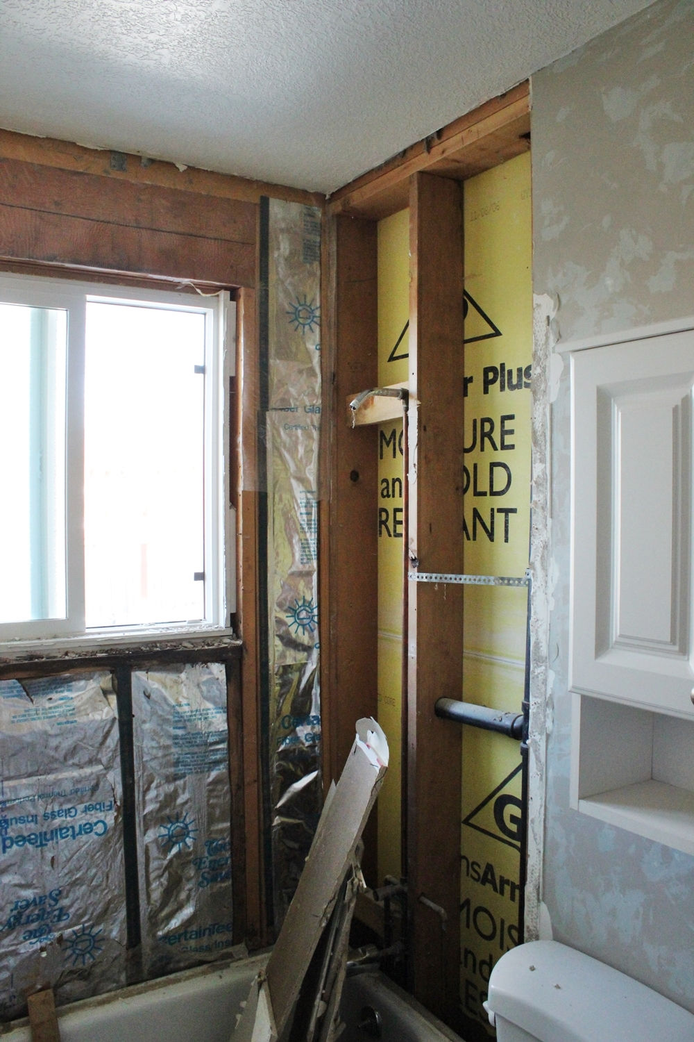 tub surround until all drywall is removed