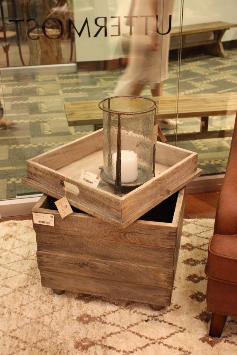 Adding rustic accessories like the metal-accented hurricane candle holder adds to the casual feeling.