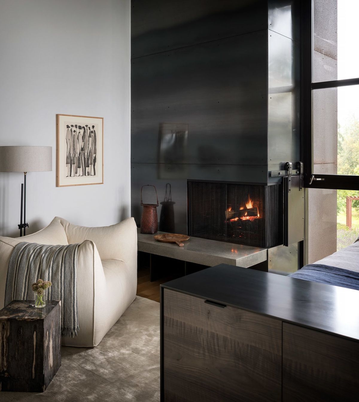 Waterfront home in the Pacific Northwest by Olson Kundig bedroom fireplace