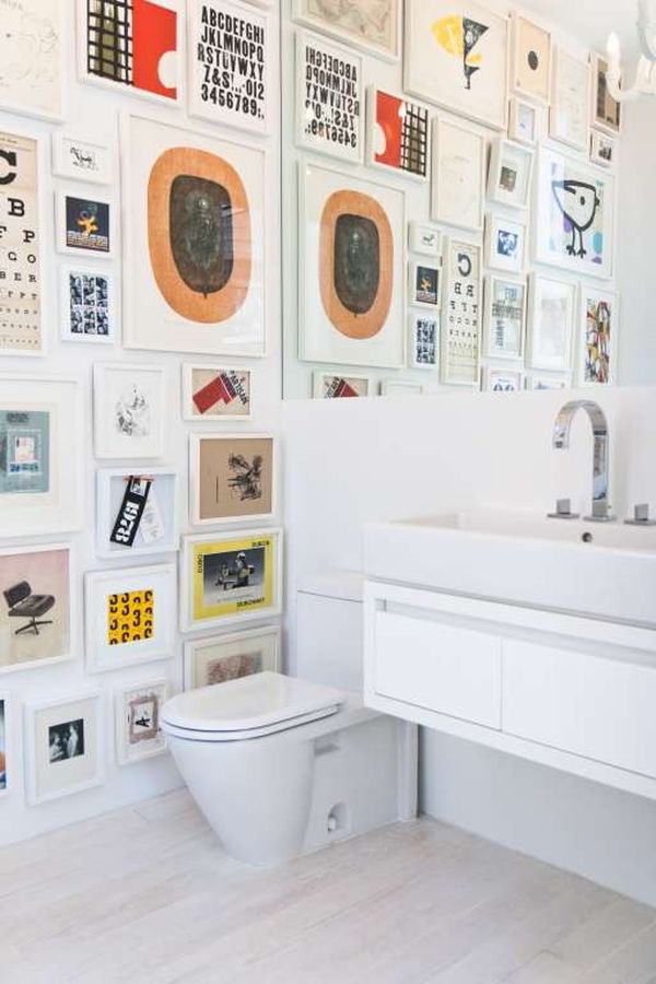 White bathroom decorated frames