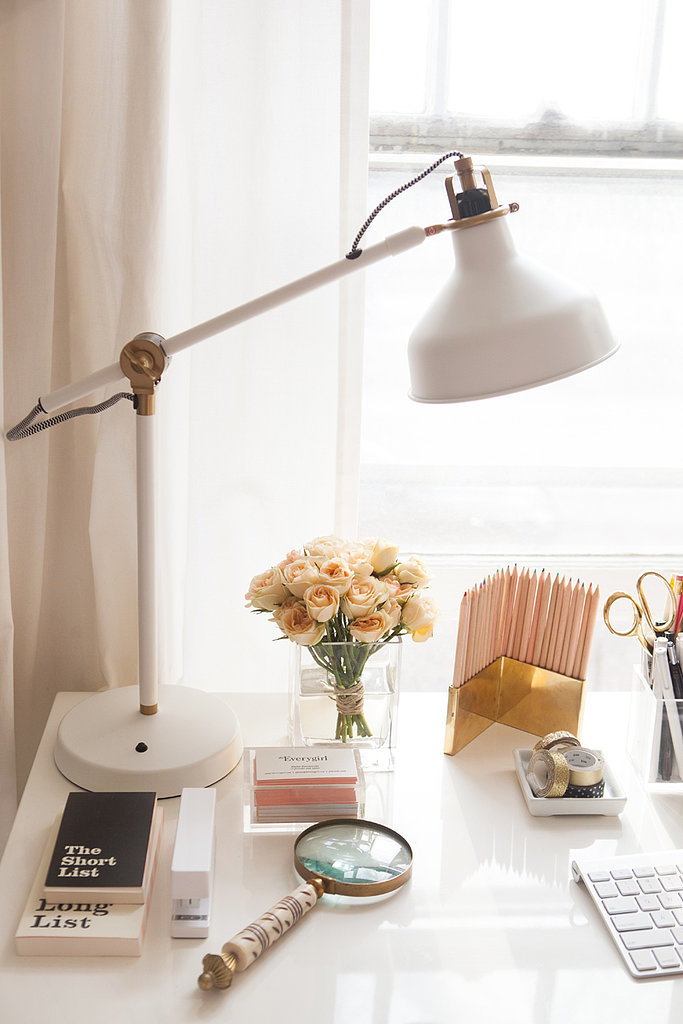 White industrial desk lamp strikes