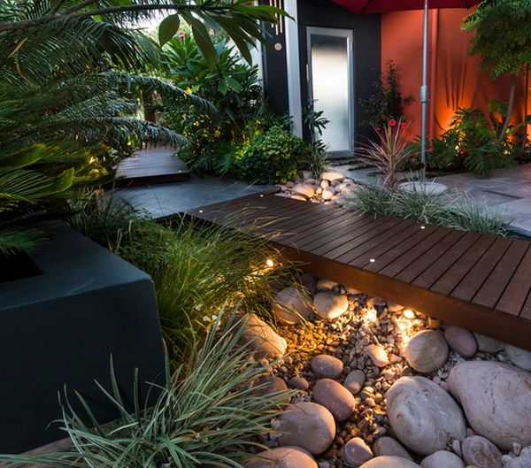 Wood and rocks perfect combination for modern backyard