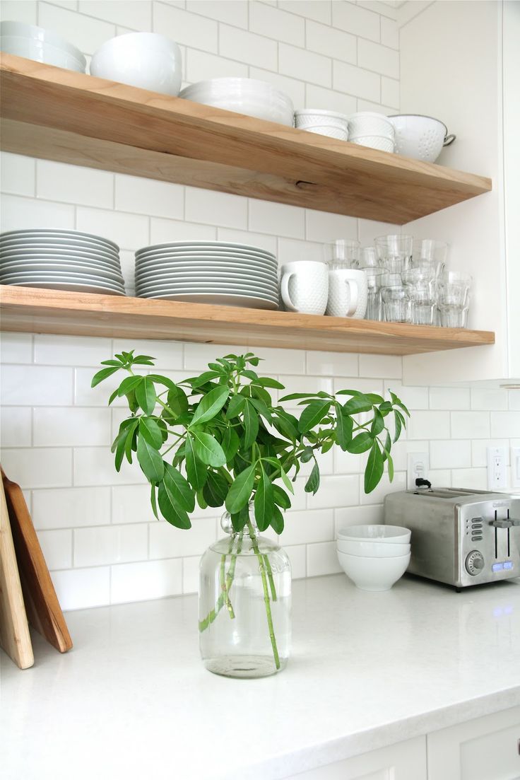 Wood shelves and subway tiles