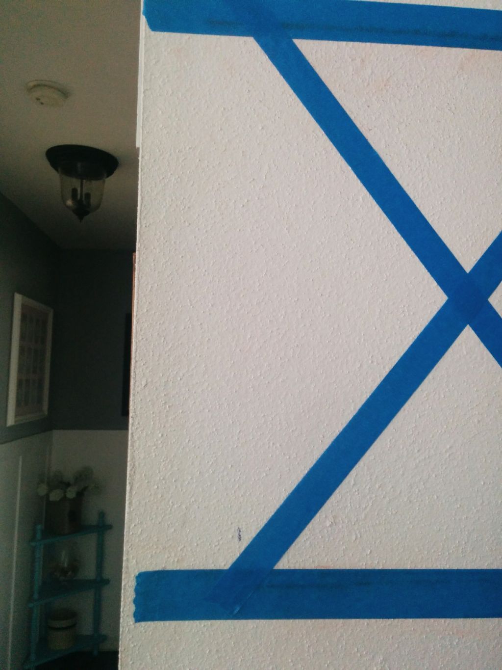 X mark painters tape on wall 5