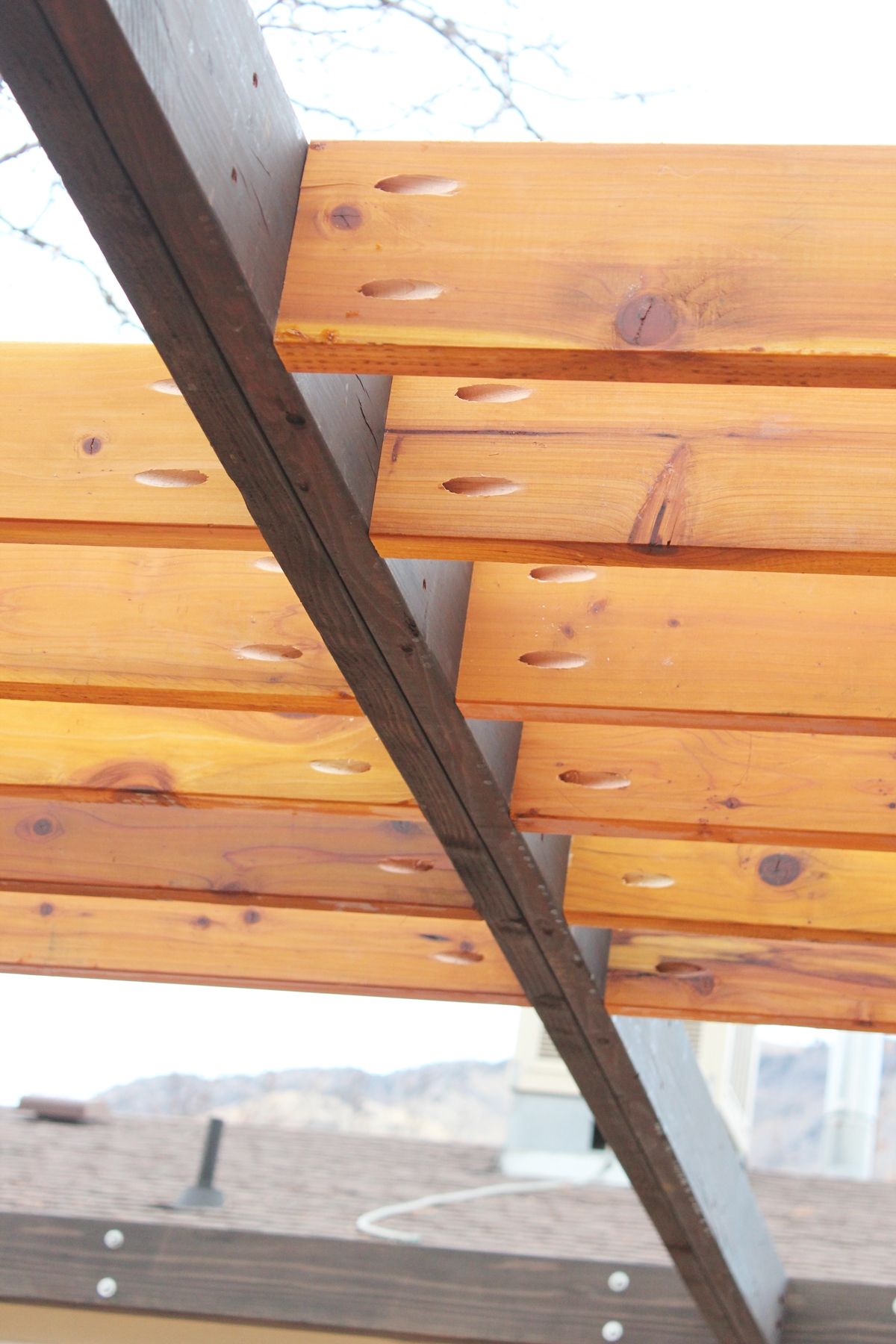 How to Install Modern Pergola Rafters Without Brackets - holes line up