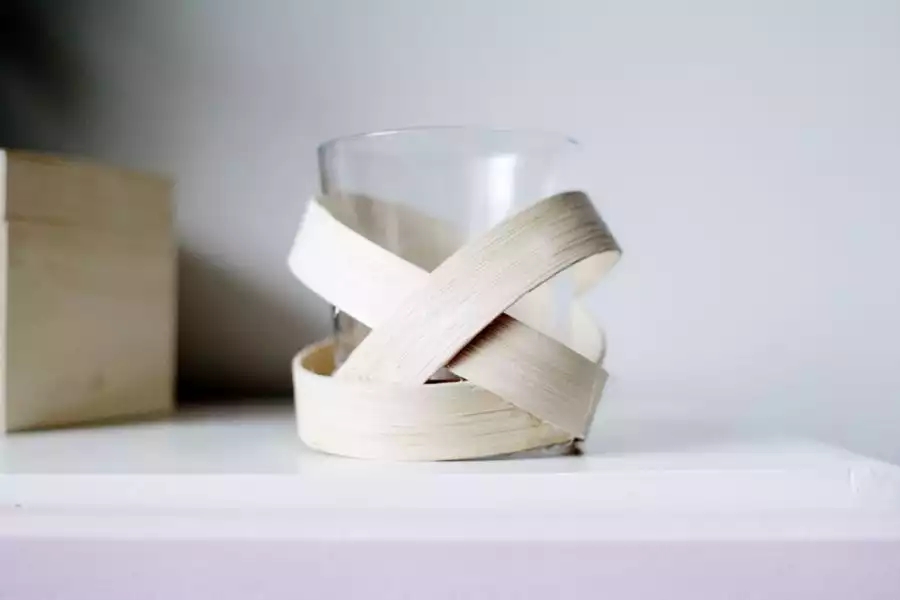 A chic wooden strip candle votive