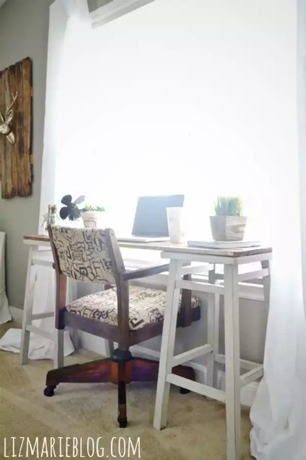 A desk made of bar stools