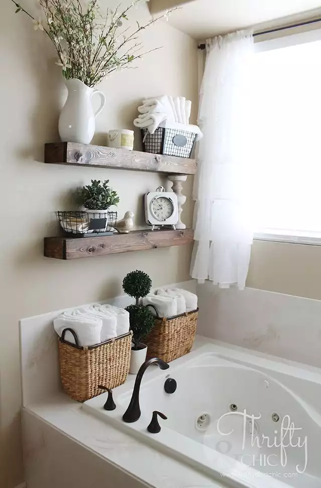 Above the bathtub rustic shelves