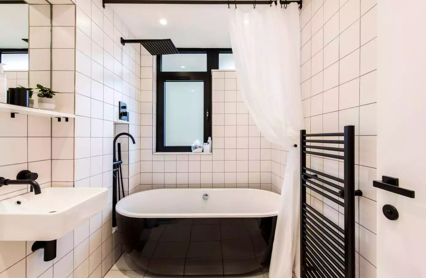 Bathroom with black fixtures accents