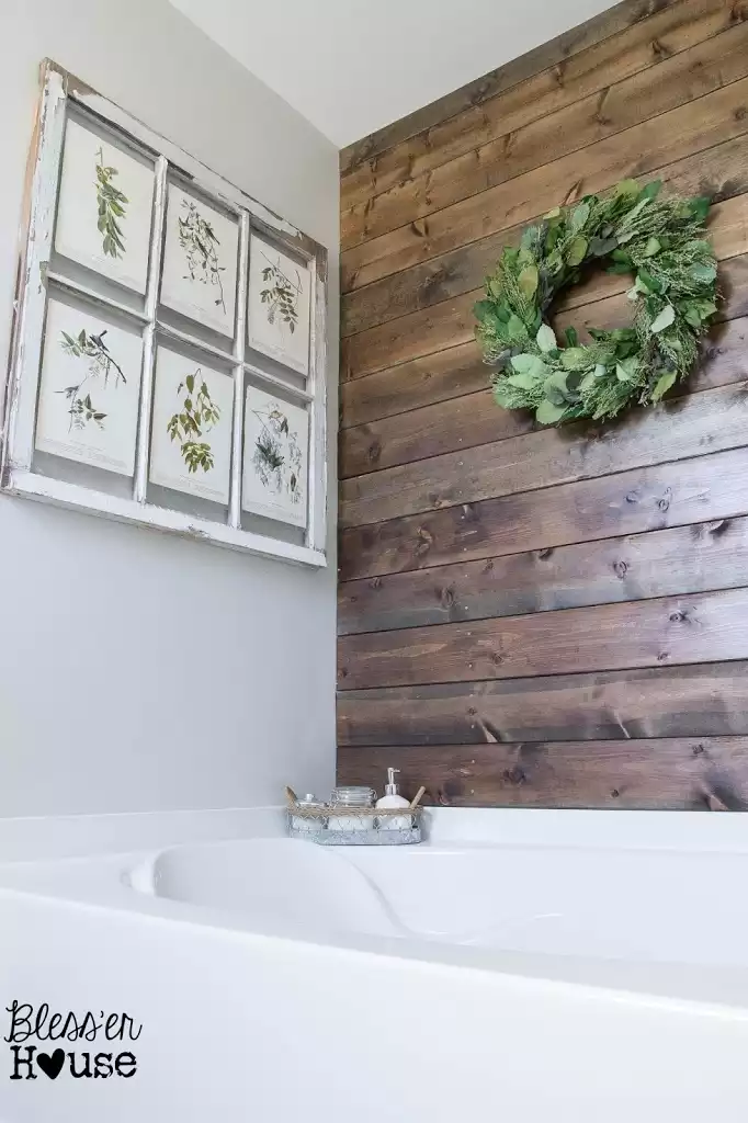 Farmhouse bathroom with wood paneling