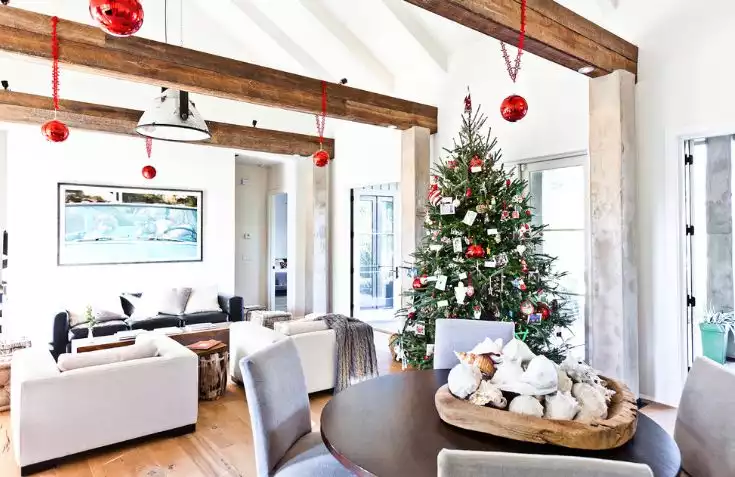 Beatiful christmas tree decorated in living room