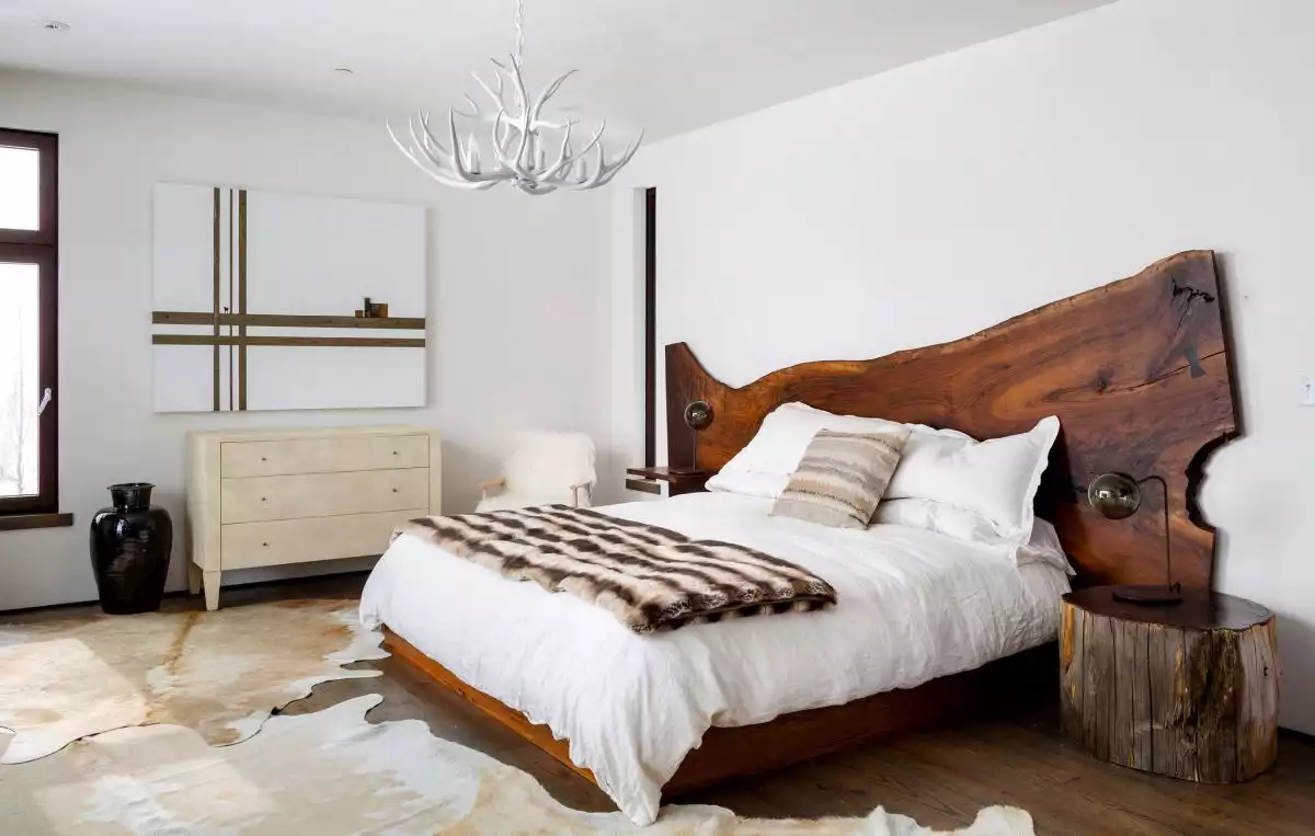 Beautiful bedroom featuring a wood live edge headboard