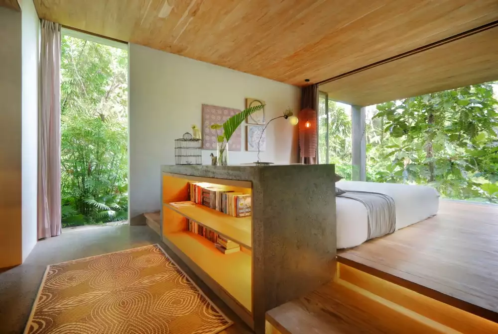 Bed with Large concrete headboard storing Books