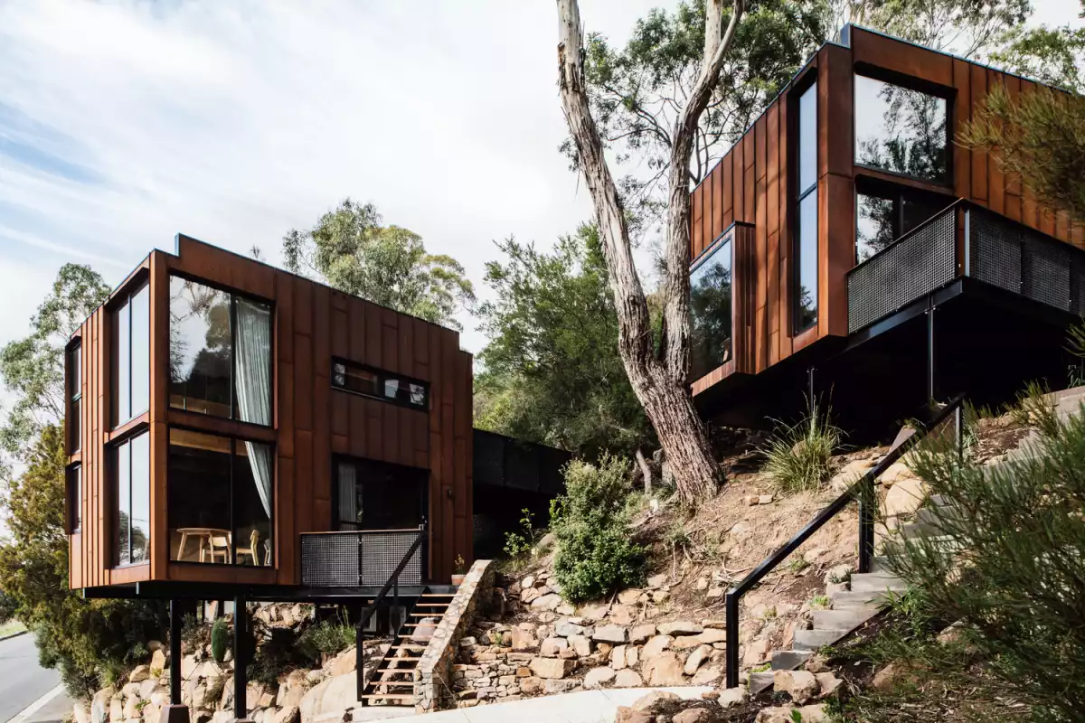 A Couple Of Tiny Corten Steel Cladding Houses Hidden In The Wilderness