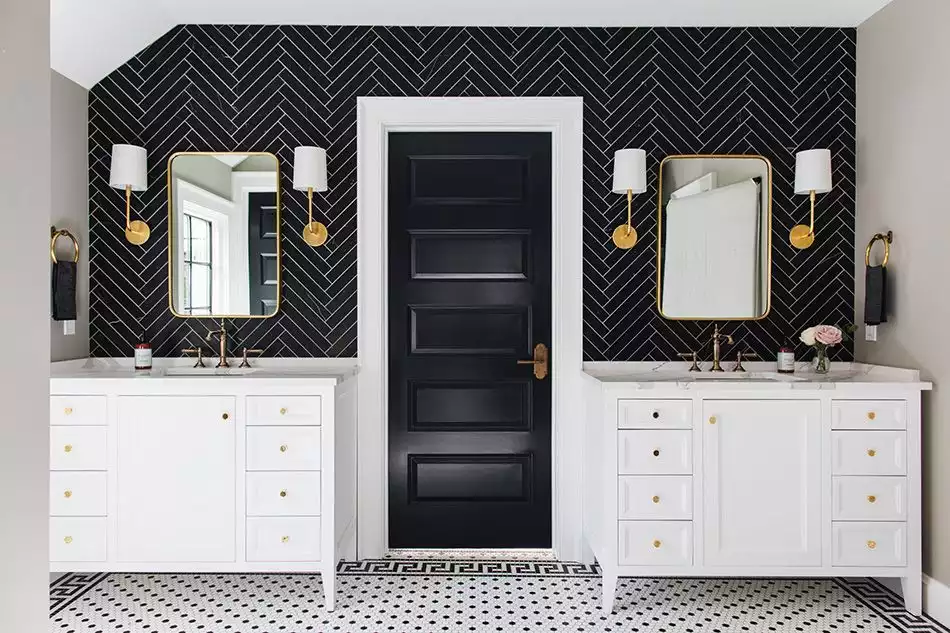 Black and white bathroom decor with chevron tiles