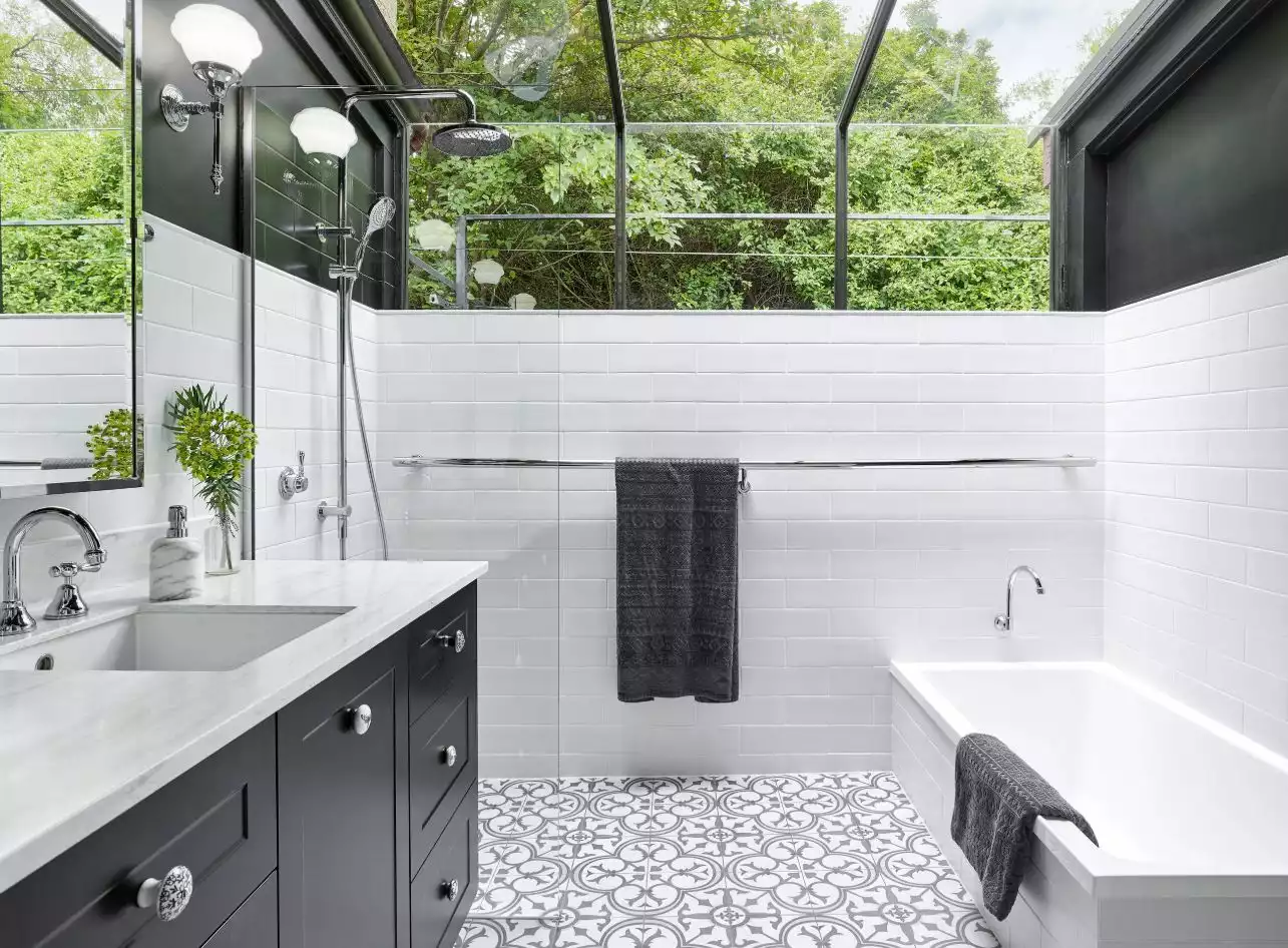 Black and white bathroom with skylight